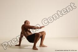 Underwear Gymnastic poses Man Black Muscular Bald Dancing Dynamic poses Academic